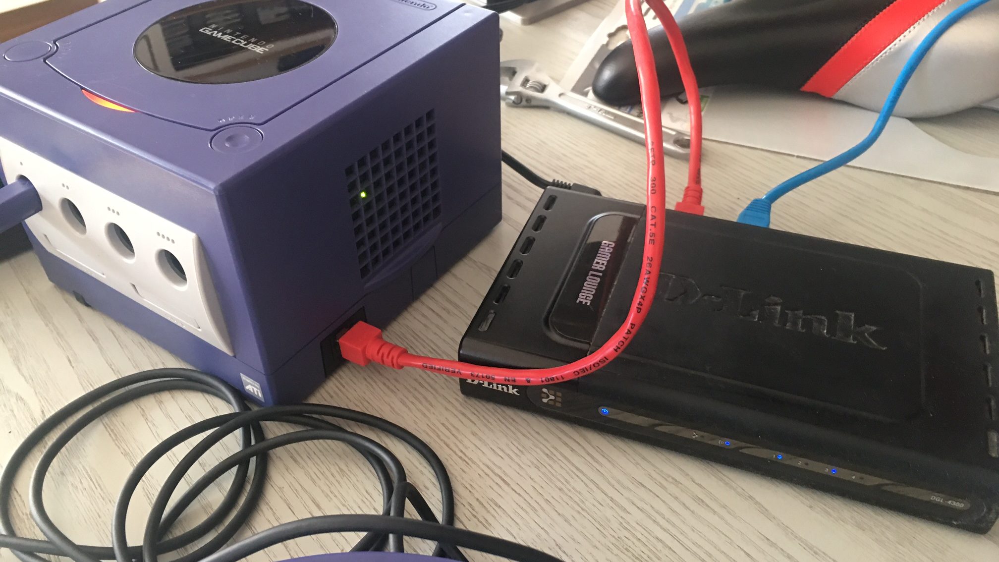 GameCube qoob pro mod attached to router